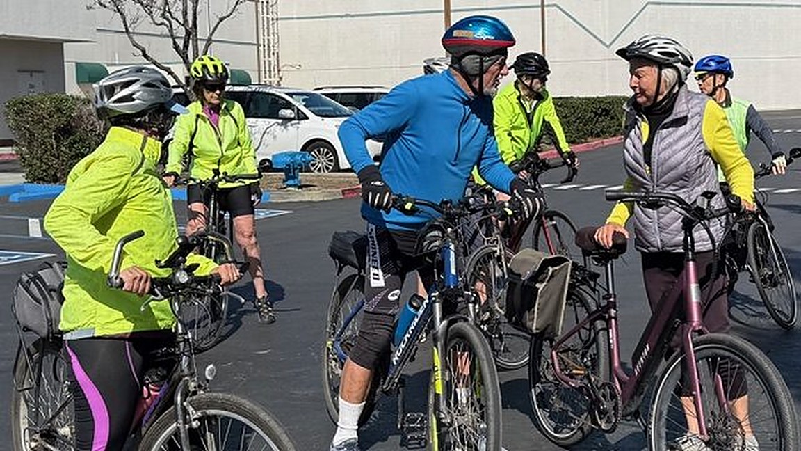 Senior Spokes riders gathering before an April ride